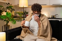 man_sick_iStock-2265379334