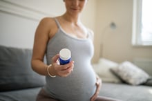pills_pregnant_iStock-1443539399