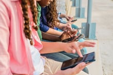 teenagers_phones_iStock-2209185951